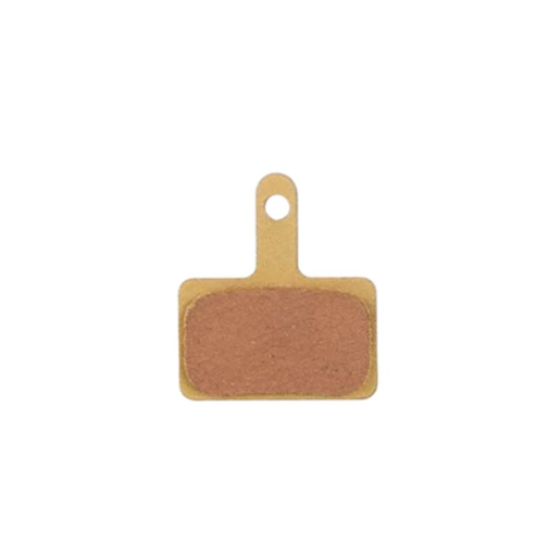 Brake pad with a tan mounting tab and brown friction surface; used for braking systems, showing a small hole for mounting