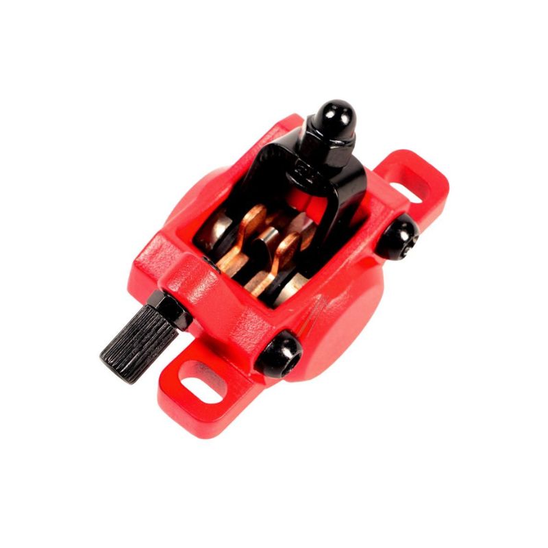 Red small mechanical component with a black adjustment knob and exposed copper springs, viewed from an angled side.