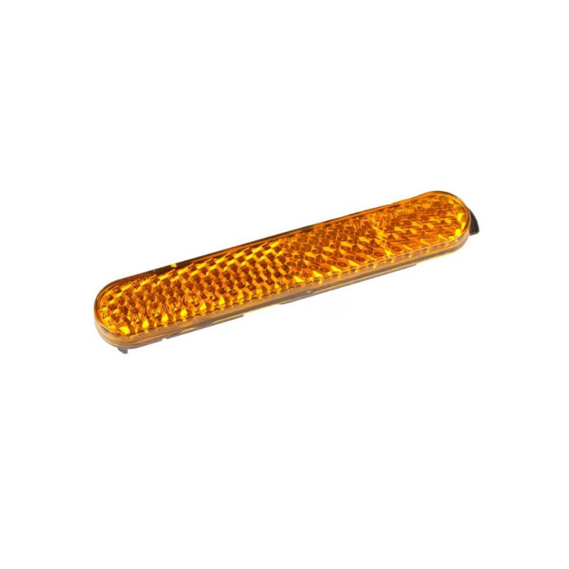 Amber LED side marker light for a vehicle, elongated rounded rectangle shape with a textured lens surface.