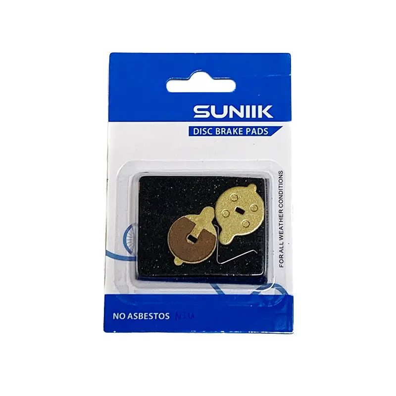 FR-NIU-copia – Elshoppen.dk Package of Sunik disc brake pads with two brass brake pad pieces visible in a blue and white blister pack.