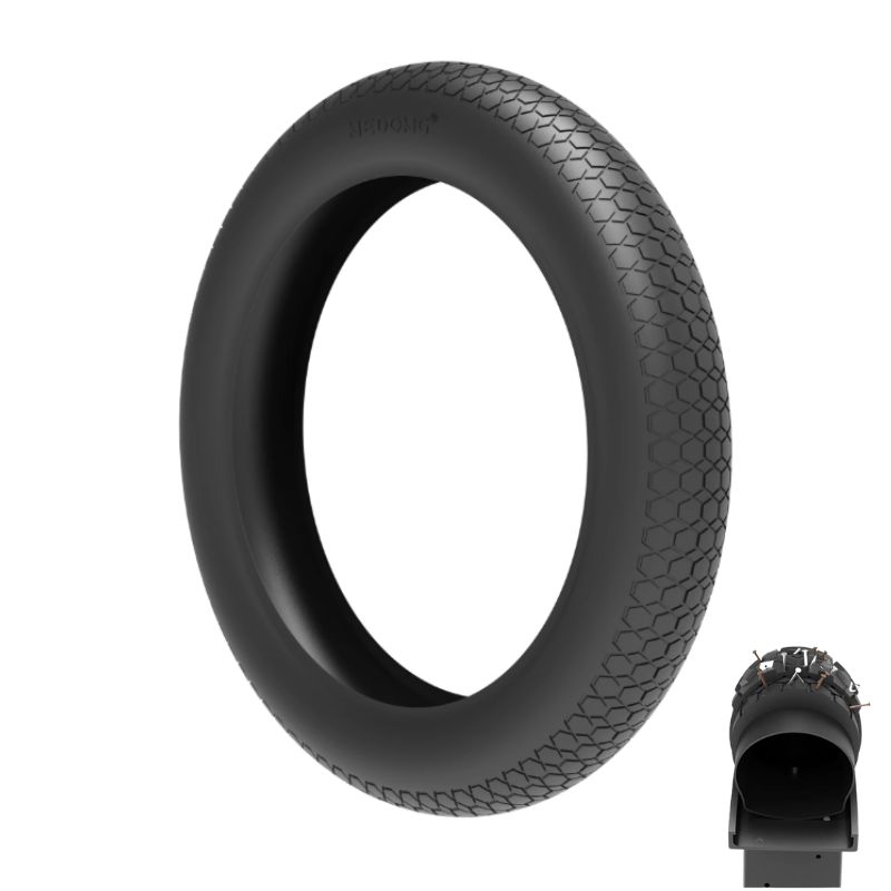 Large black tire with a textured honeycomb tread; small cross-section view shown in the lower-right corner.